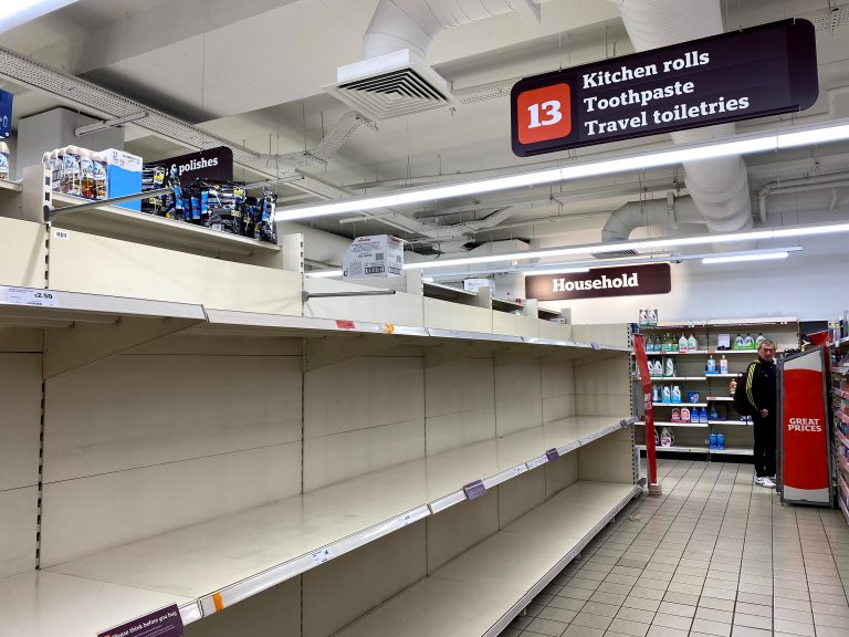 Empty store shelves for household items